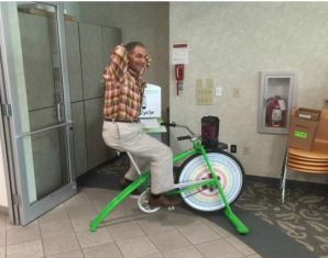 GE Healthcare Madison, WI chief medical officer boosting employee morale by blending smoothies on a Fender Blender bike