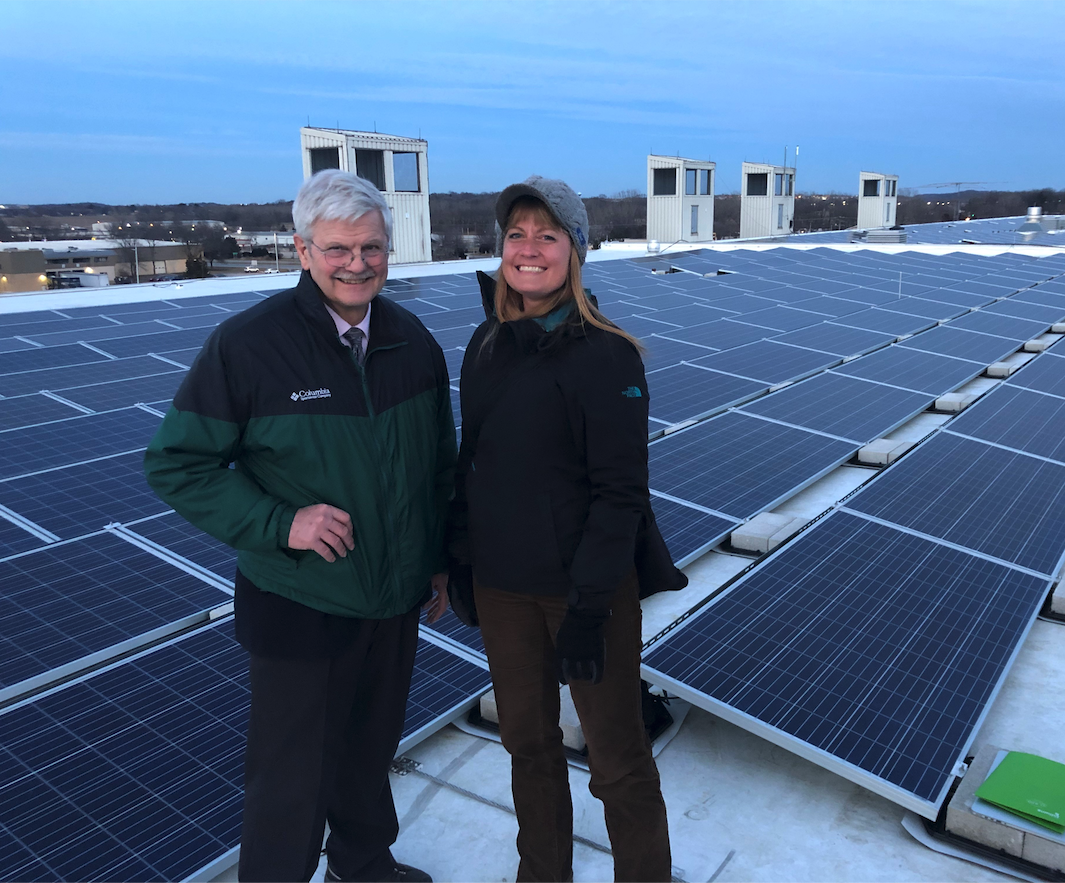 Stacie Reece and Wisconsin State Senator Mark Miller at Madison College's solar panel installation.