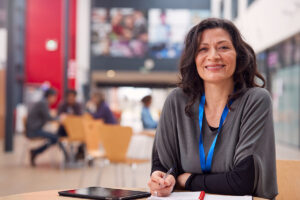 Woman in workplace with tablet.