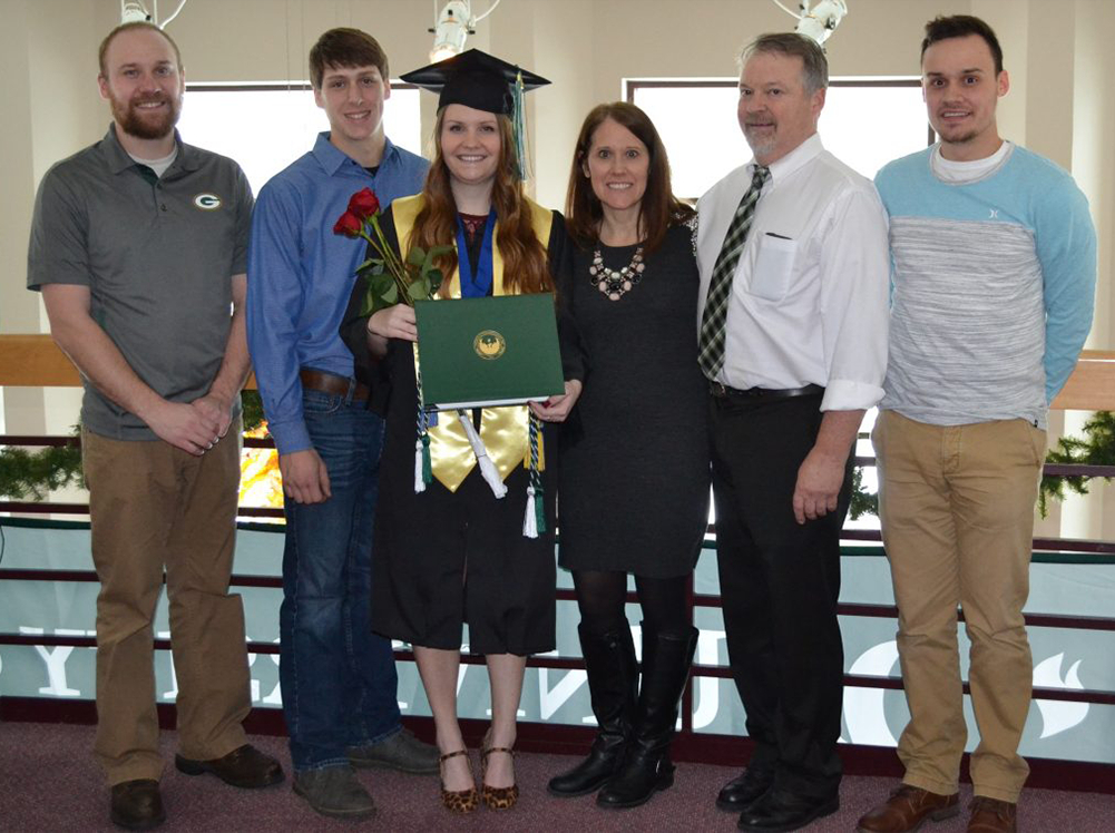 Katie Eichman celebrating graduation with her family