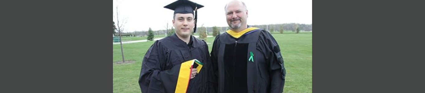 Matthew Christianson, UW System’s first Sustainable Management master’s degree graduate, with professor Dr. John Katers.