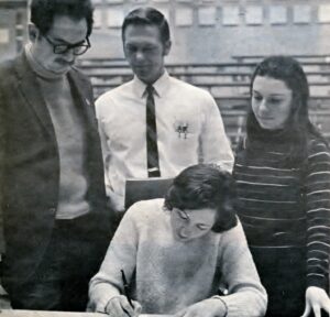 Students signing petition in 1970 to amend state constitution.