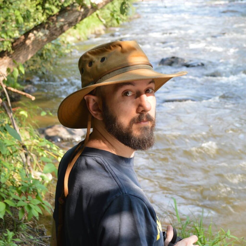 headshot of Adam Poch