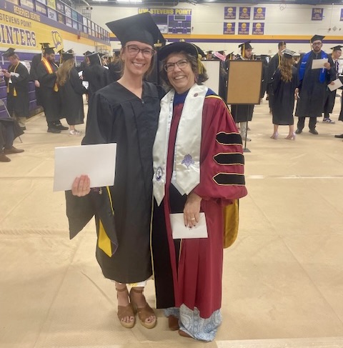 Jodi stands with Healthcare Administration student Bianca at her graduation ceremony.