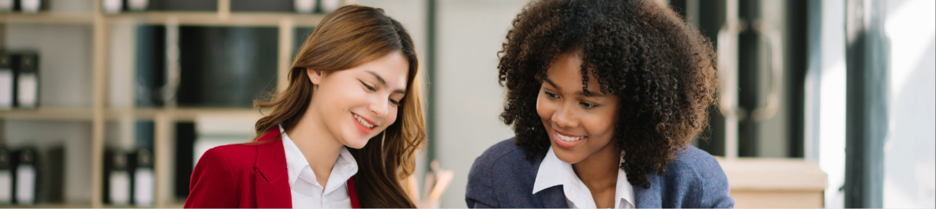two professional working women having a conversation