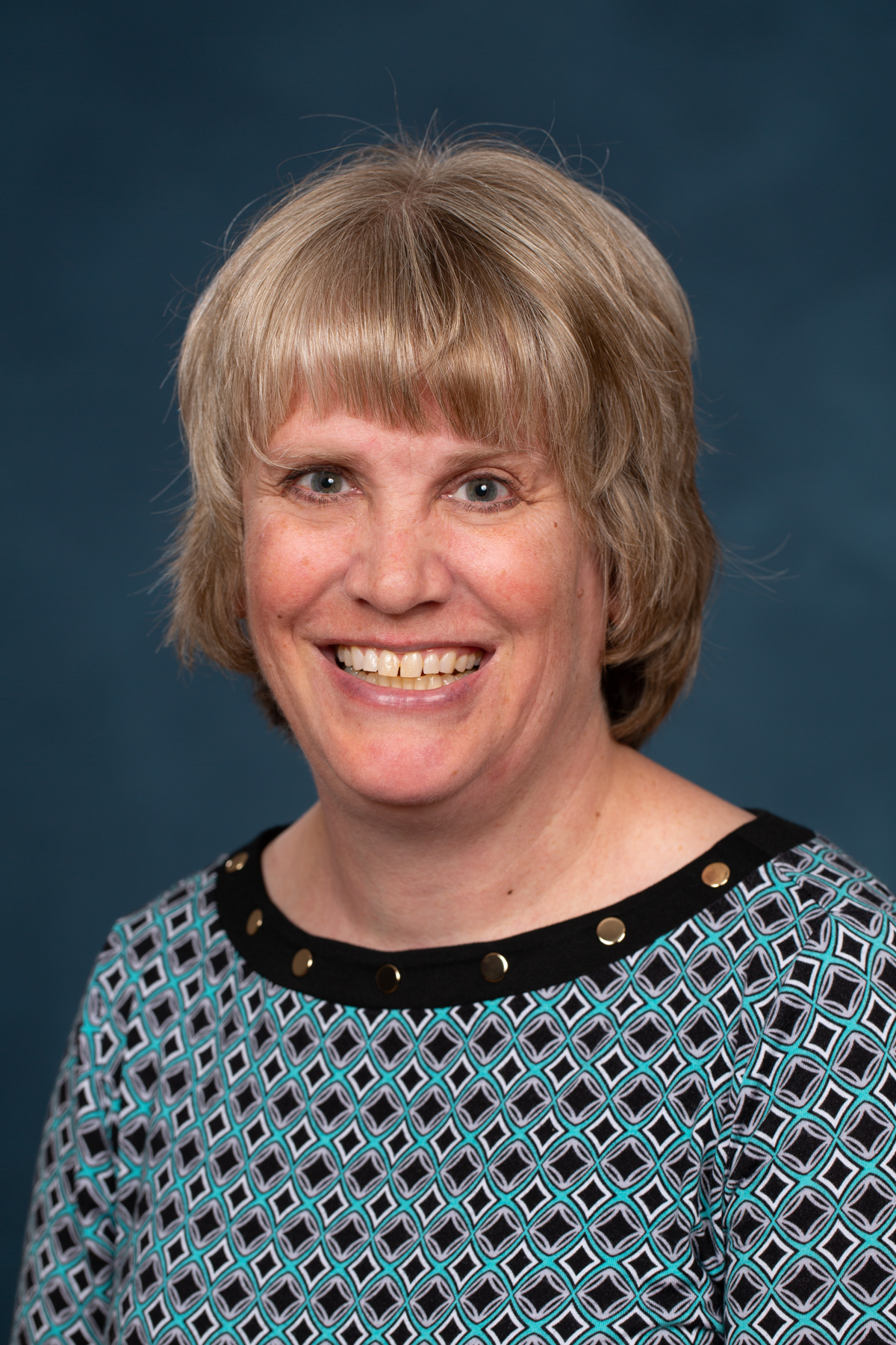 A professional headshot of Dr. Kristine Prahl. 